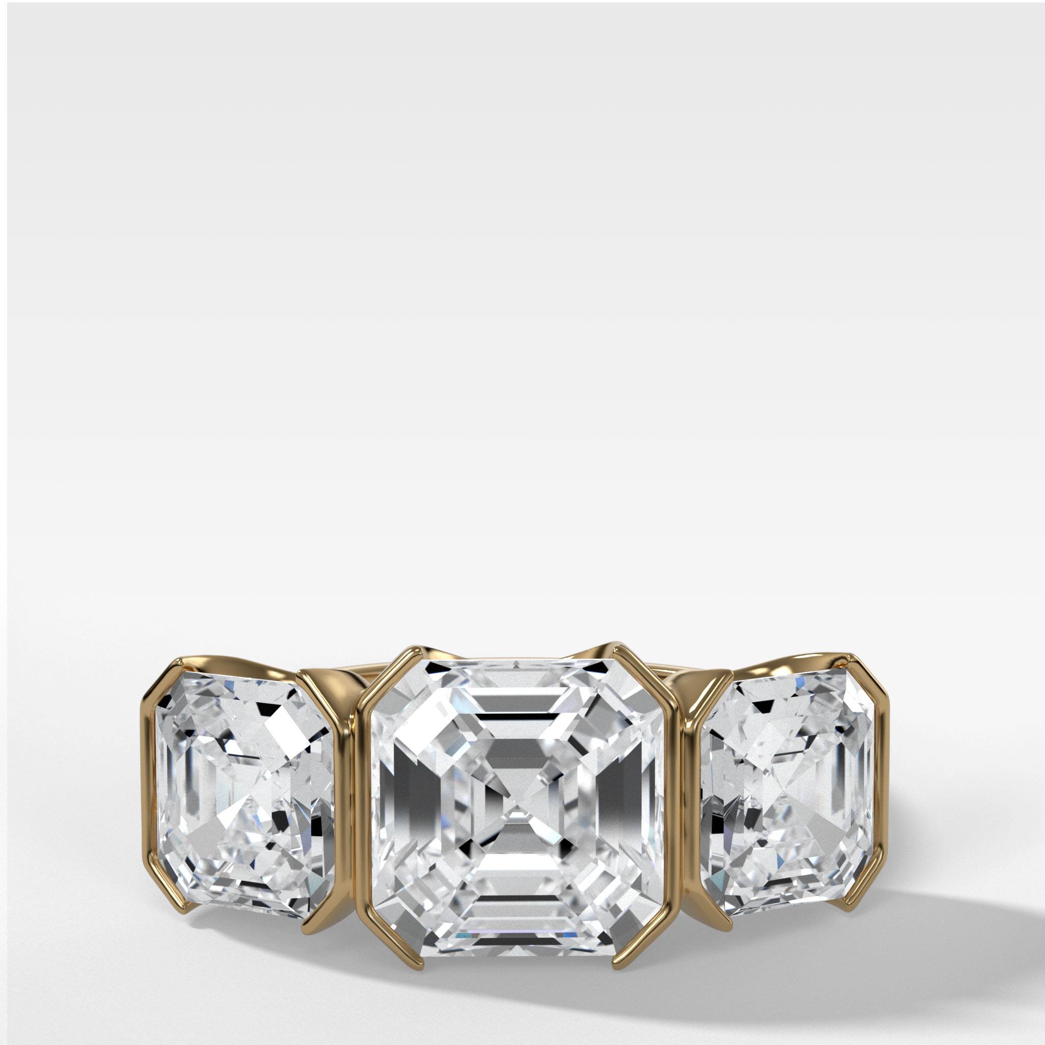 Half Bezel Triad Engagement Ring With Asscher Cut Diamonds