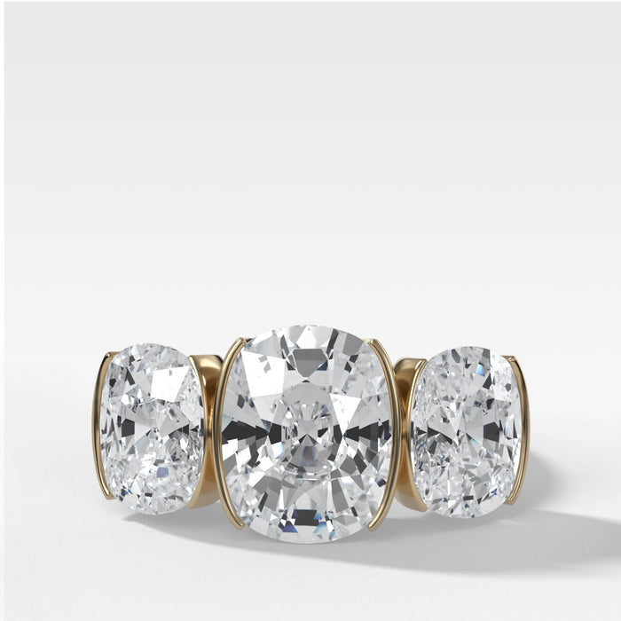 Half Bezel Triad Engagement Ring With Elongated Cushion Cut Diamonds