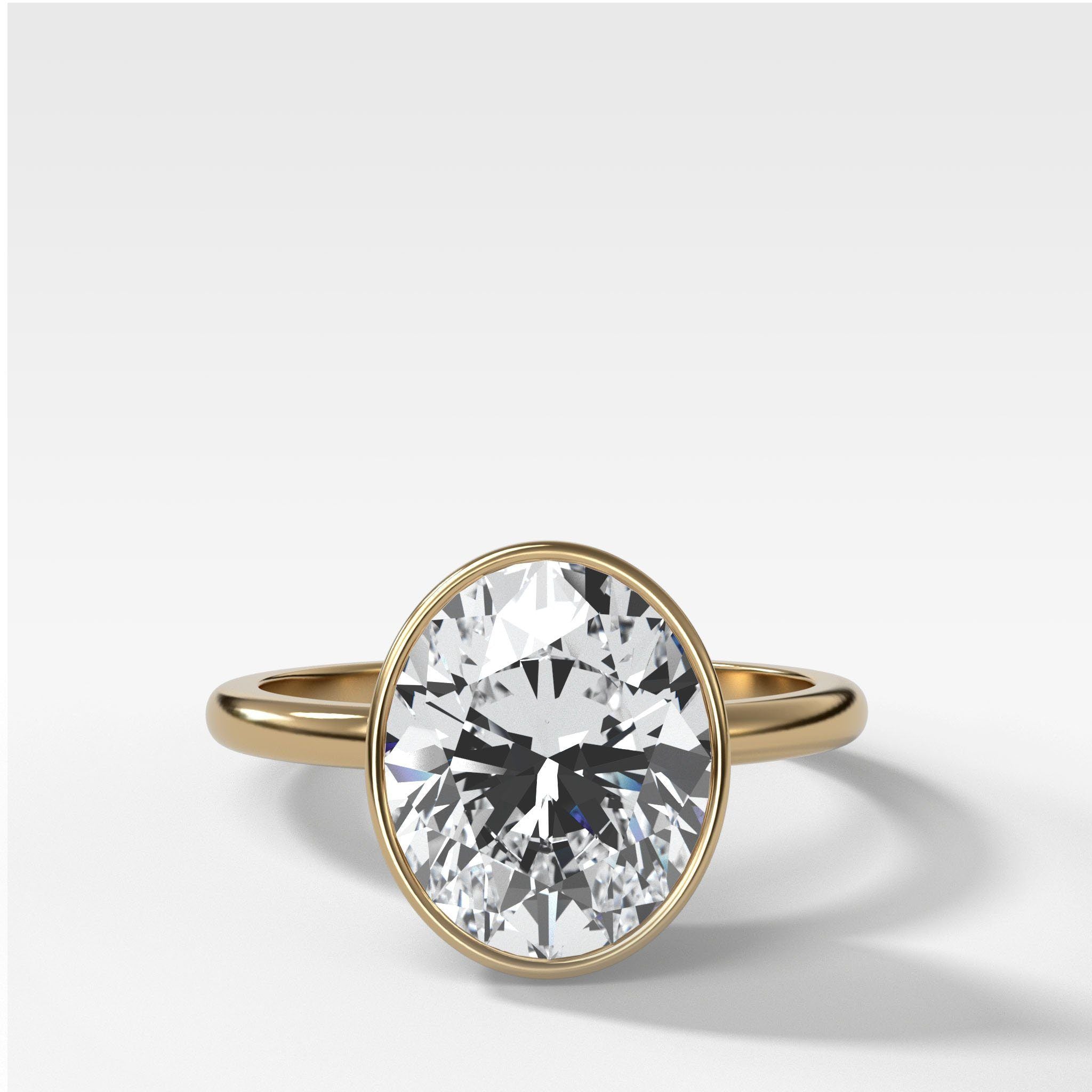 Penumbra Bezel Set Engagement Ring With Oval Cut