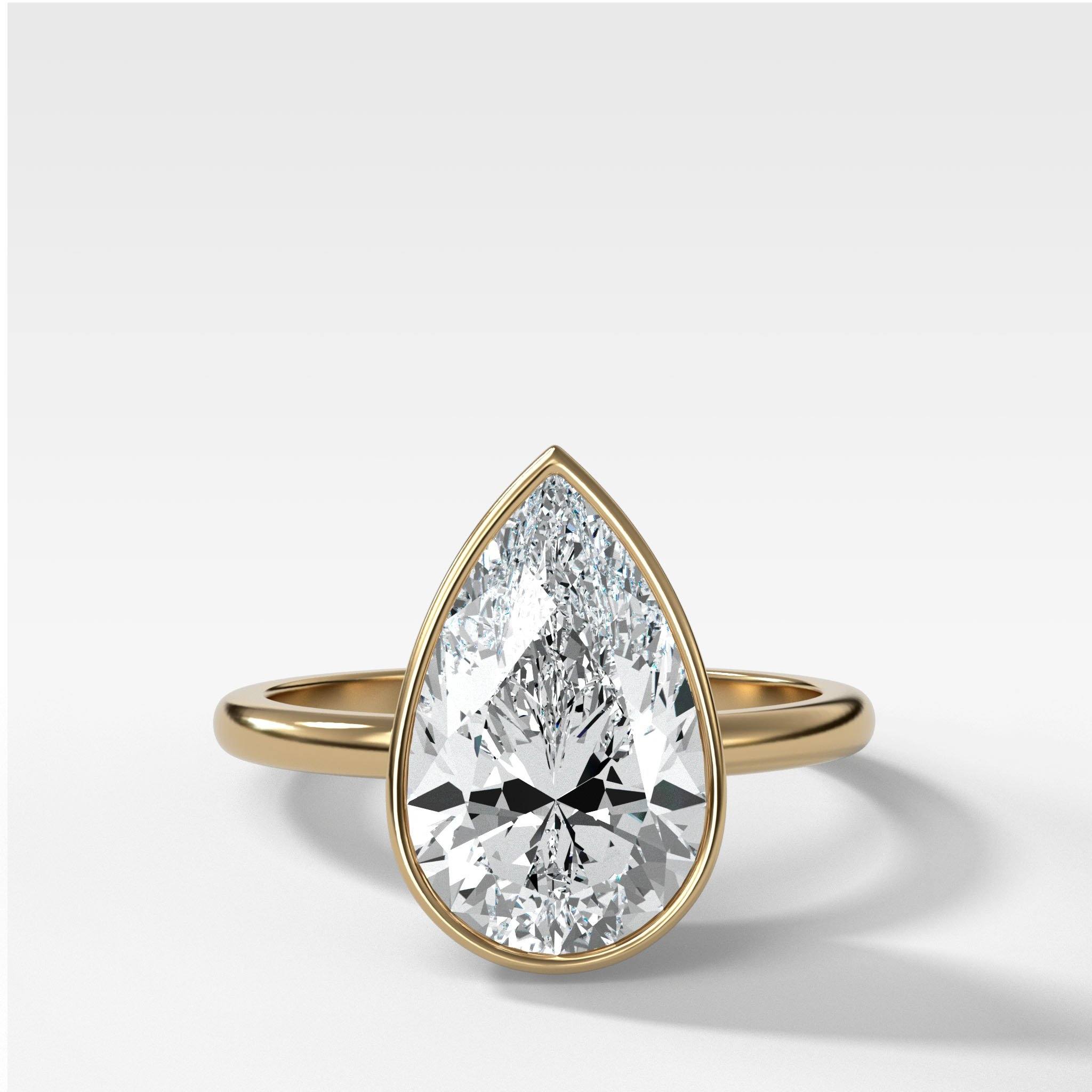 Penumbra Bezel Set Engagement Ring With Pear Cut
