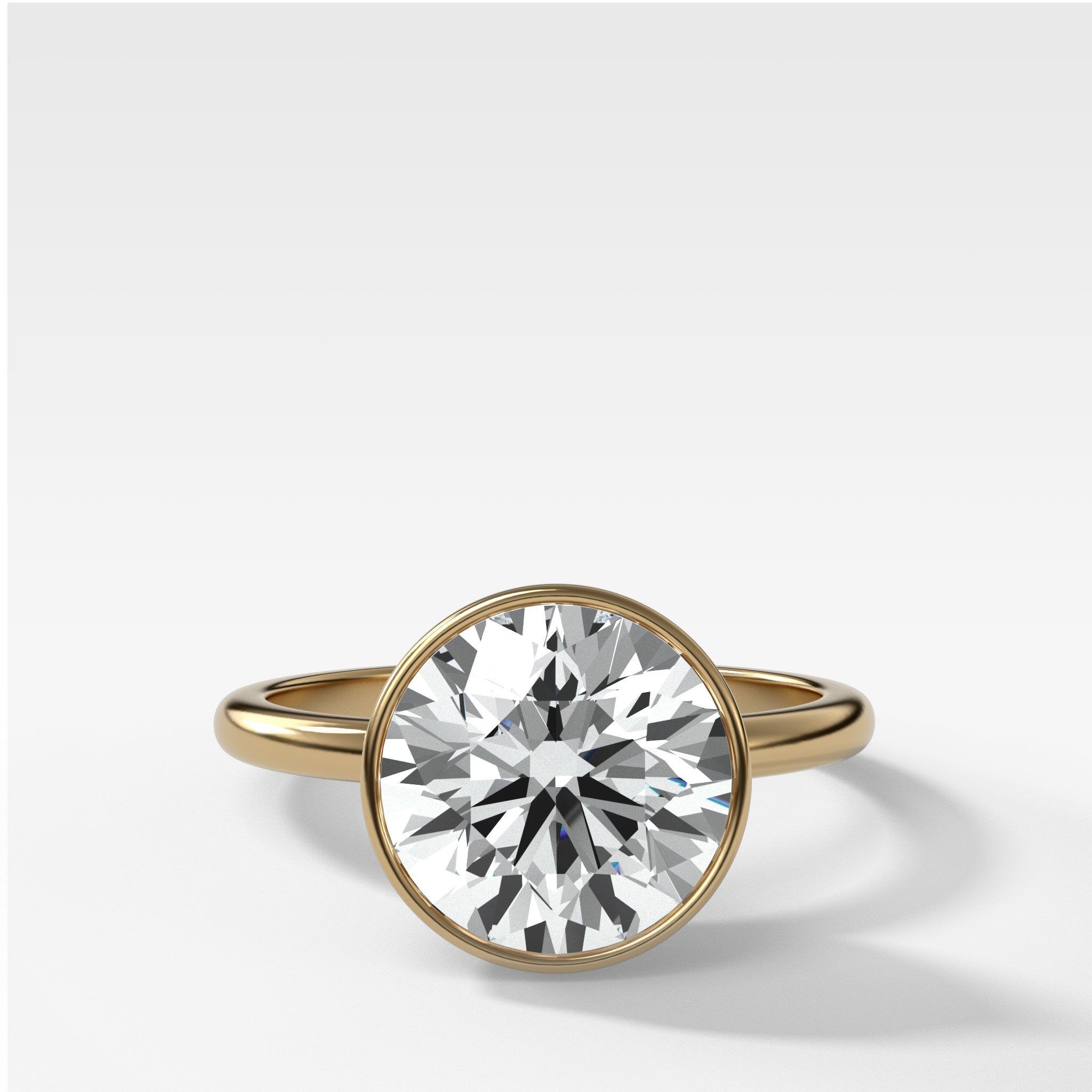 Penumbra Bezel Set Engagement Ring With Round Cut