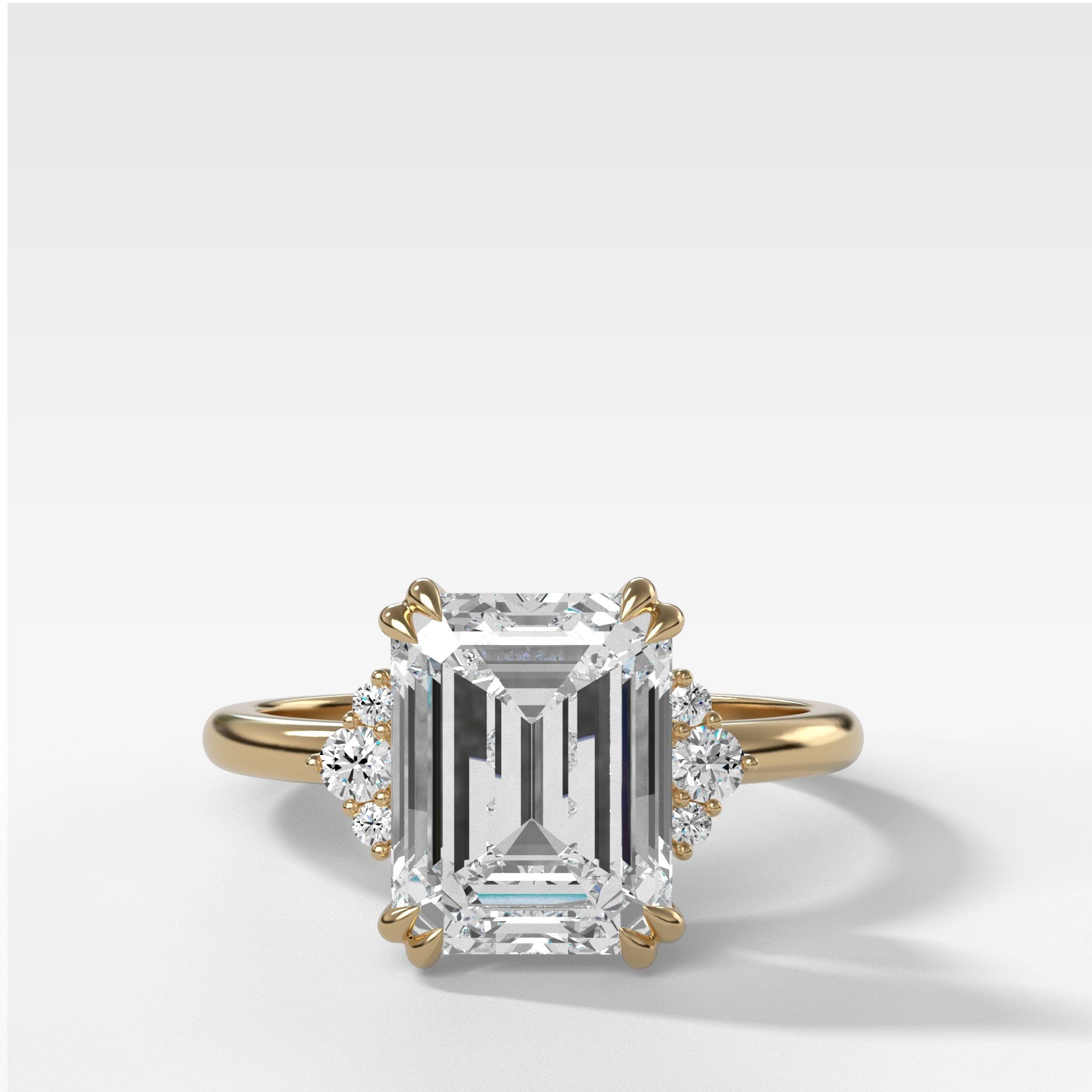 Signature Cluster Engagement Ring With Emerald Cut Diamond