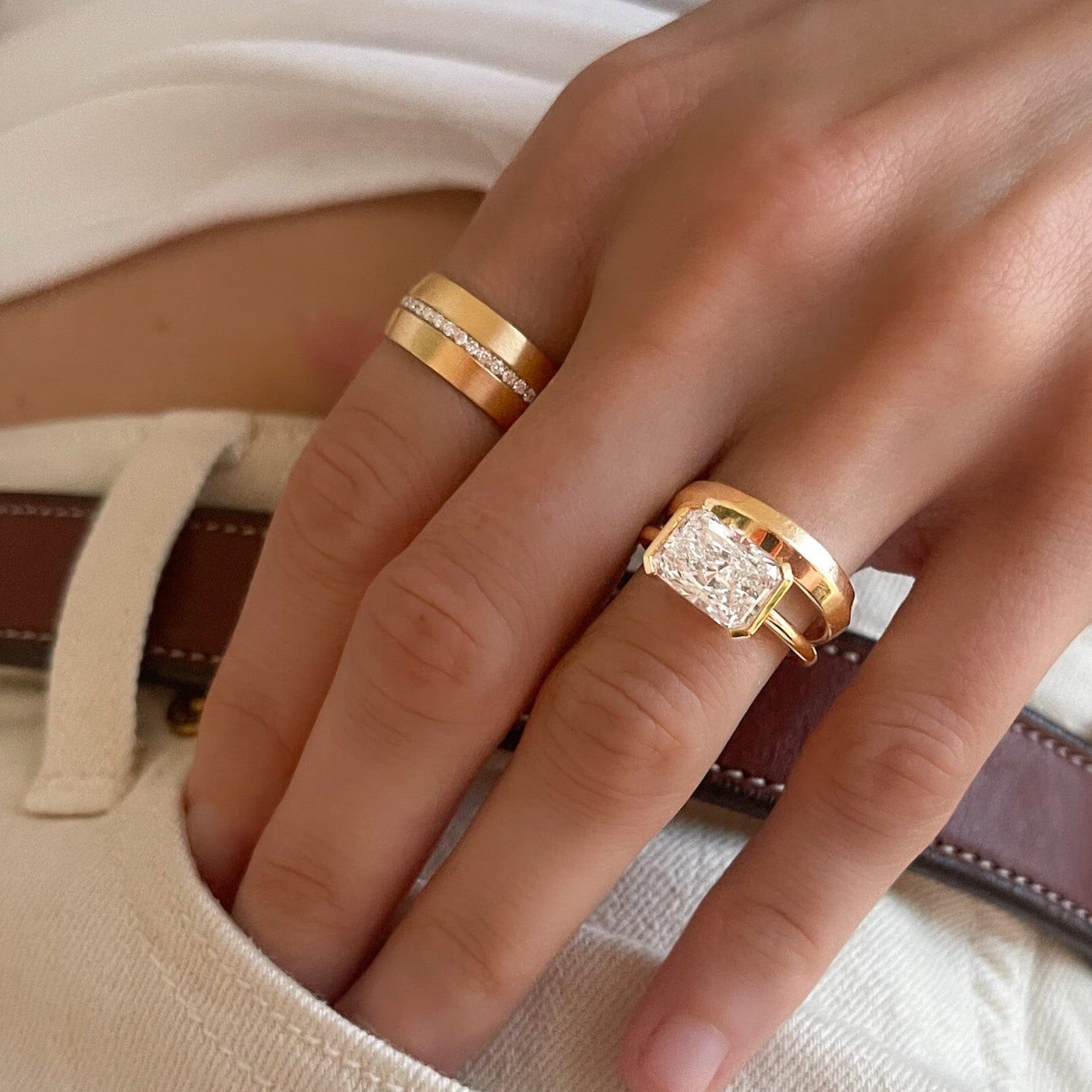 East West Half Bezel Solitaire Engagement Ring With Elongated Radiant Cut Diamond